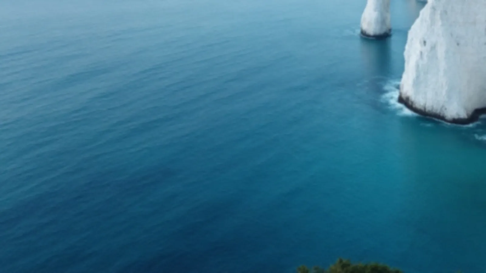 Clear turquoise sea below white chalk, the BluffOvia view of bad credit personal loans, $100 – $5,000